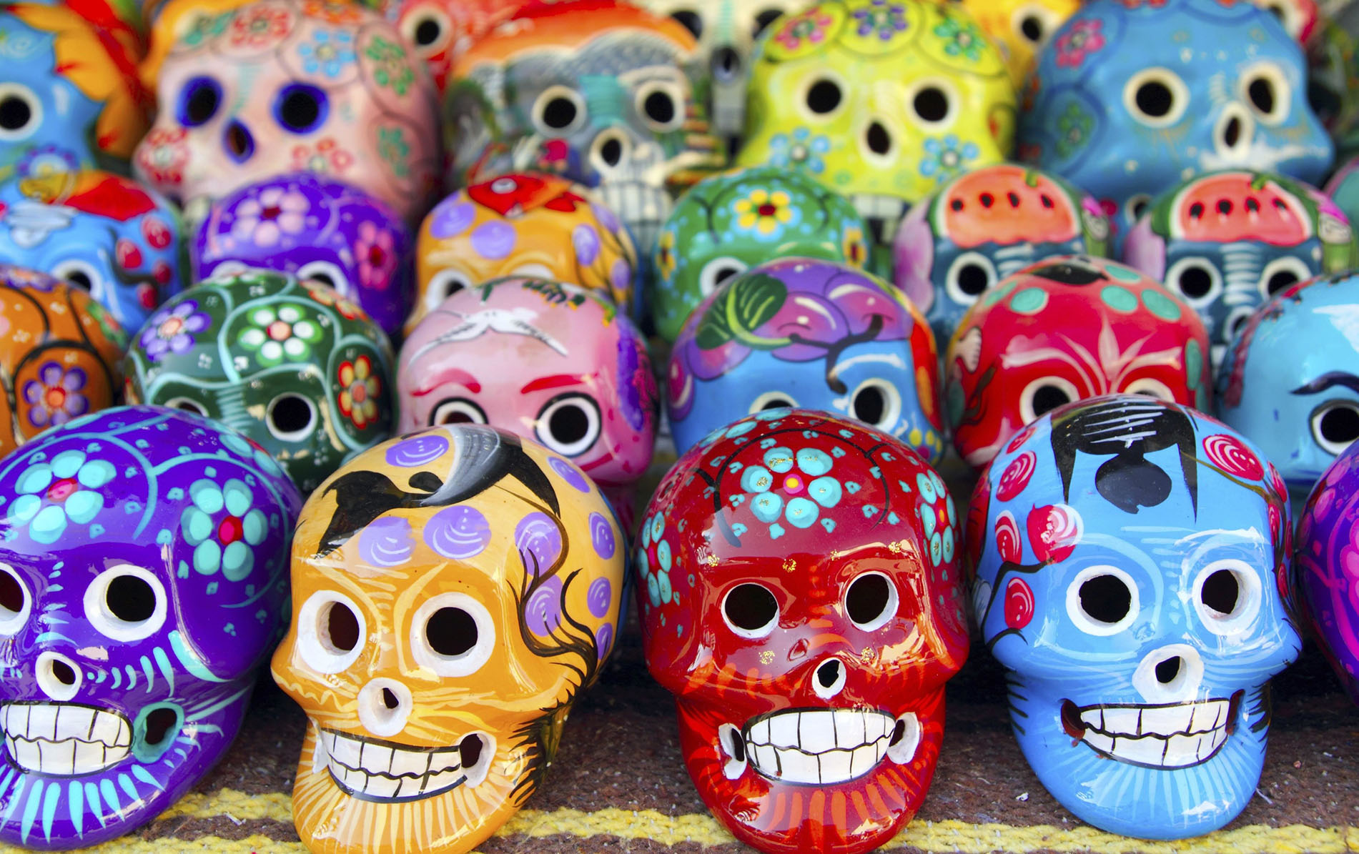 Aztec skulls Mexican Day of the Dead colorful handcrafts