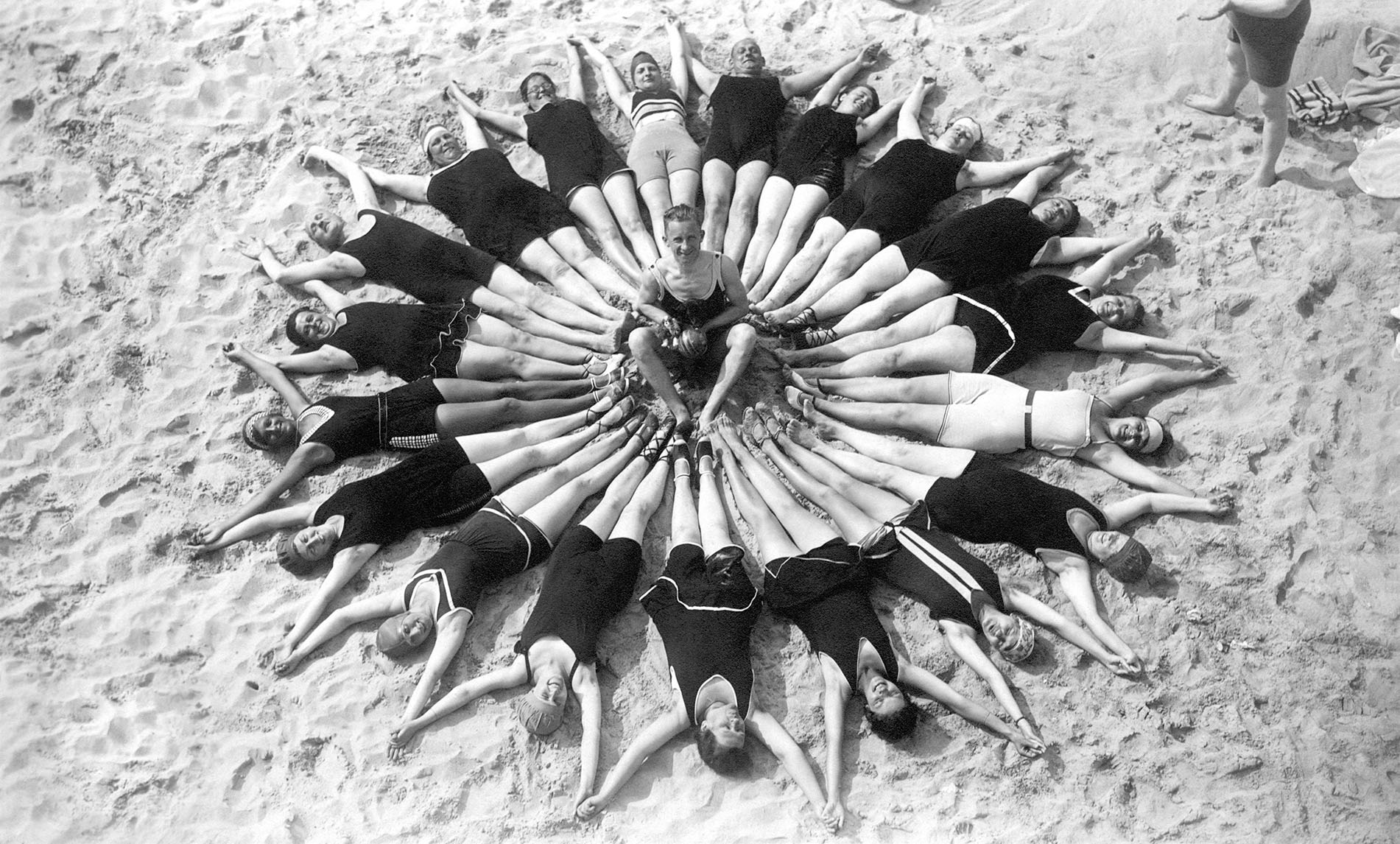 Group with bathers on the beach