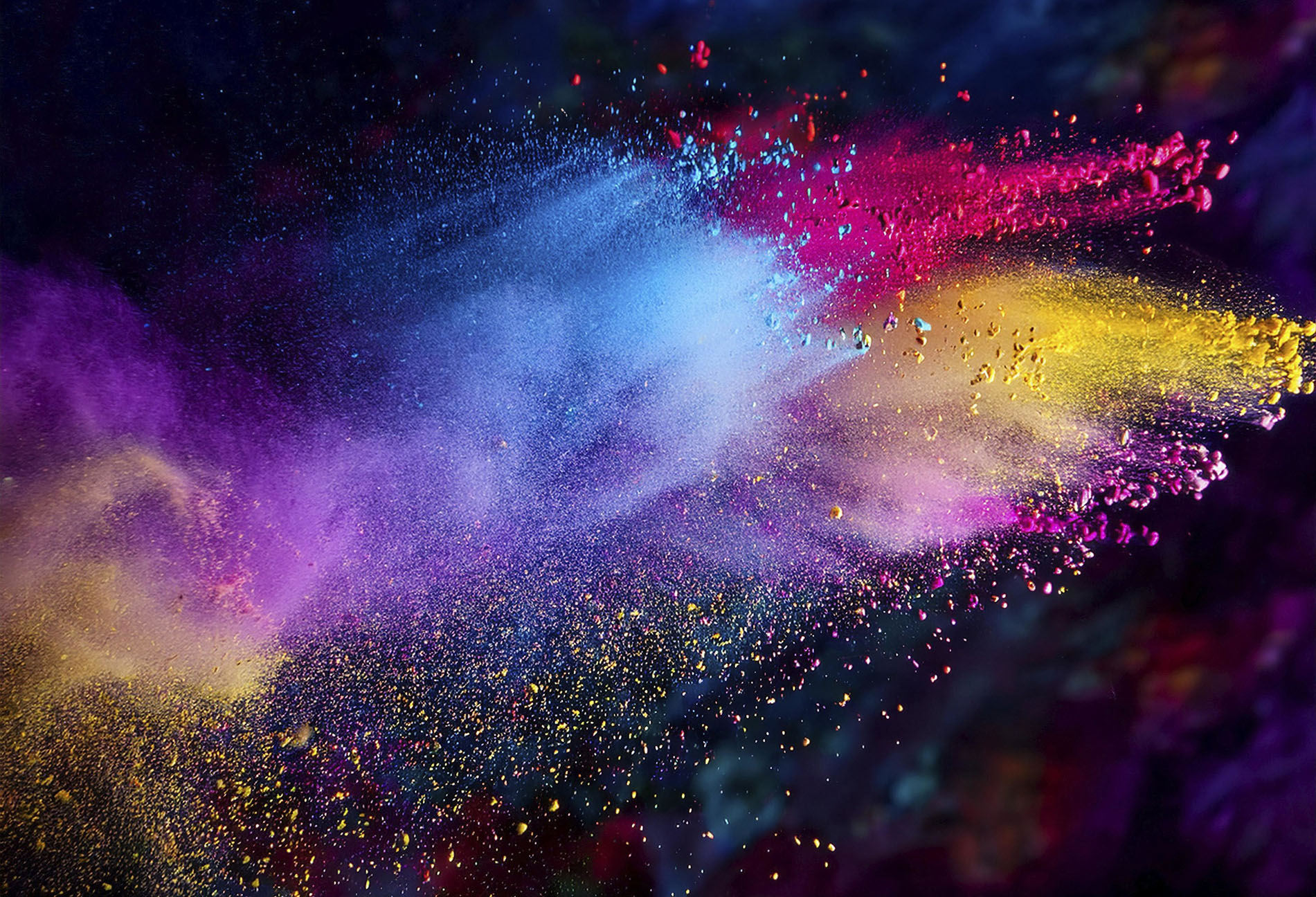 A colorful explosion powder on black background.. Multicolored powder explosion, AI generated