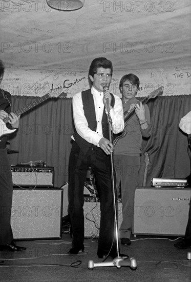 Rock band performing at the Golf-Drouot, 1964