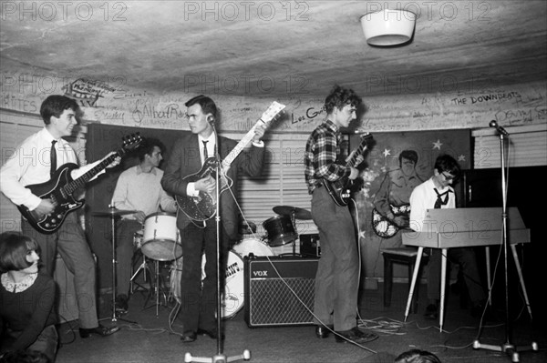 Rock band performing at the Golf-Drouot, 1964