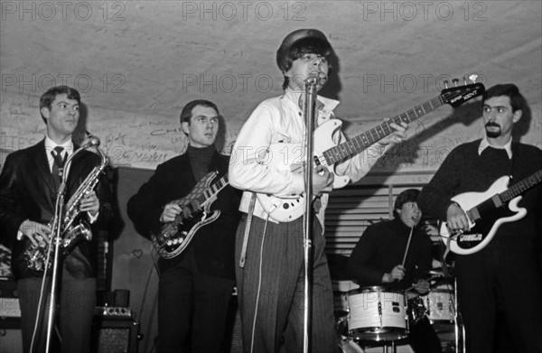 Rock band performing at the Golf-Drouot, 1964