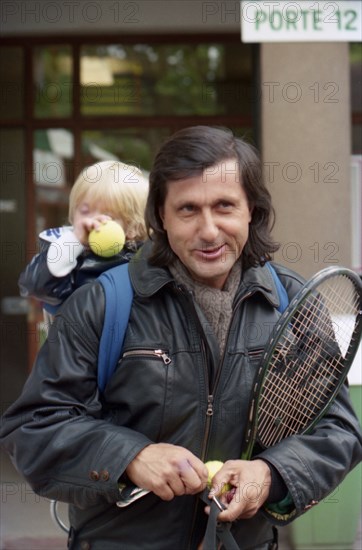 Ilie Nastase with son at the 1989 French Open