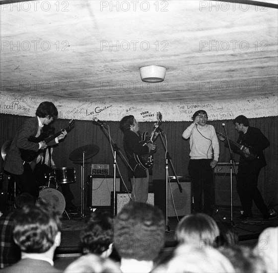 Rock band performing at the Golf-Drouot, 1964