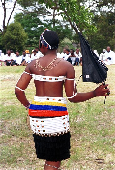 Gingindlovu, KwaZulu-Natal, South Africa
12/2003
young woman, youth, girls, shembe girl, dancing with an umbrella, celebration, zulus, zulu people, zulu girls, zulu women, african religions