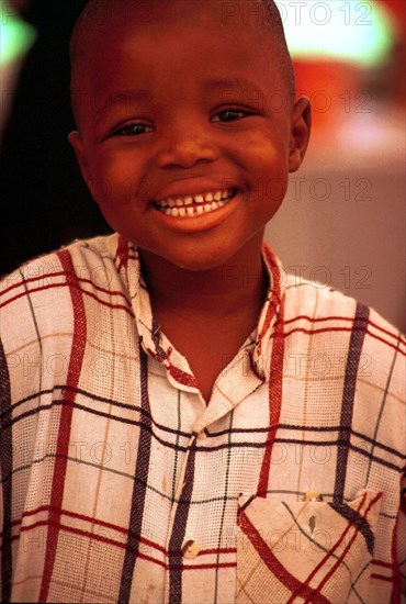 11/1999 Pietermaritzburg, KwaZulu-natal, South Africa

child, fun, kids, children, african child, zulu child, smile, smiling, faces, face