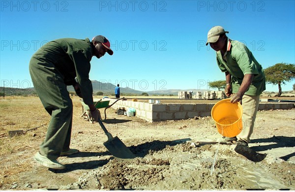 5-6/2003 Msinga, KwaZulu Natal, South Africa

rural, building schools, education, cement, construction, spade, bucket, rural, blocks