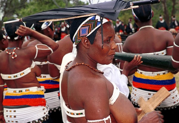 12/2003 Gingindlovu, KwaZulu-Natal, South Africa
shembe woman, women, zulu, shembe celebration, culture, traditions, religion, zulu women, traditional clothes, umbrella, umbrellas