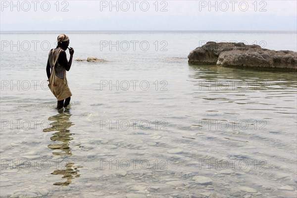 Burundi, Fishermen in lake Tanganjika with the Democratic Republic of Congo slightly visible in the background, February 2006.