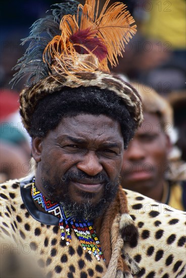 Heritage Day in South Africa Coincides with the Zulu celebration of Shaka Day in honour of the founding king of the Zulu nation. On this day the Zulu King, currently King Goodwill Zwelithini, the Zulu Royal Family, the chiefs and large crowds of Zulu subjects in traditional clothing gather to celebrate. There are speeches, but there is also much dancing and singing. 

It was during the speeches when all the press cameras were turned on the King and Zulu politicians of the likes of former vice president Jacob Zuma, that I managed to get close to a group of amakhosi (chieftains) to take individual portraits. It is a sign of disrespect to look an older man, and particularly an "inkosi" in the eye so I had to work carefully. I kept low and my subjects were fortunately gracious.