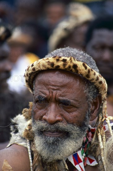 Heritage Day in South Africa Coincides with the Zulu celebration of Shaka Day in honour of the founding king of the Zulu nation. On this day the Zulu King, currently King Goodwill Zwelithini, the Zulu Royal Family, the chiefs and large crowds of Zulu subjects in traditional clothing gather to celebrate. There are speeches, but there is also much dancing and singing. 

It was during the speeches when all the press cameras were turned on the King and Zulu politicians of the likes of former vice president Jacob Zuma, that I managed to get close to a group of amakhosi (chieftains) to take individual portraits. It is a sign of disrespect to look an older man, and particularly an "inkosi" in the eye so I had to work carefully. I kept low and my subjects were fortunately gracious.