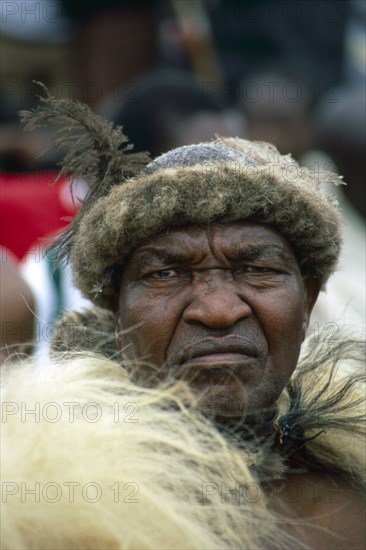 Heritage Day in South Africa Coincides with the Zulu celebration of Shaka Day in honour of the founding king of the Zulu nation. On this day the Zulu King, currently King Goodwill Zwelithini, the Zulu Royal Family, the chiefs and large crowds of Zulu subjects in traditional clothing gather to celebrate. There are speeches, but there is also much dancing and singing.
It was during the speeches when all the press cameras were turned on the King and Zulu politicians of the likes of former vice president Jacob Zuma, that I managed to get close to a group of amakhosi (chieftains) to take individual portraits. It is a sign of disrespect to look an older man, and particularly an "inkosi" in the eye so I had to work carefully. I kept low and my subjects were fortunately gracious.