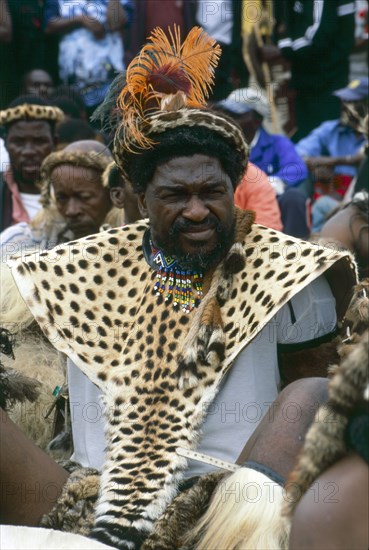 Heritage Day in South Africa Coincides with the Zulu celebration of Shaka Day in honour of the founding king of the Zulu nation. On this day the Zulu King, currently King Goodwill Zwelithini, the Zulu Royal Family, the chiefs and large crowds of Zulu subjects in traditional clothing gather to celebrate. There are speeches, but there is also much dancing and singing. 

It was during the speeches when all the press cameras were turned on the King and Zulu politicians of the likes of former vice president Jacob Zuma, that I managed to get close to a group of amakhosi (chieftains) to take individual portraits. It is a sign of disrespect to look an older man, and particularly an "inkosi" in the eye so I had to work carefully. I kept low and my subjects were fortunately gracious.