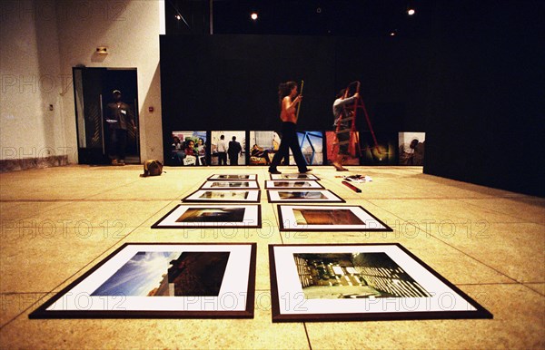 Setting up photographic exhibition at the National Museum before the launch of the 6th African Encounters of Photography, Bamako, Mali, November 2005