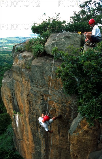 abseiling on a crag