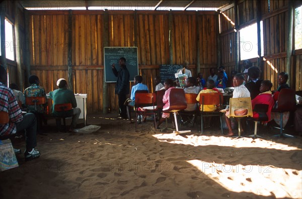 school with a sand floor