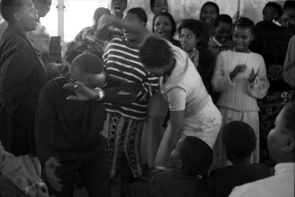 Celebration service for the opening of a new church in Hopewell, Pietermaritzburg, South Africa
9/1999
dancing, praising, worship, praise, dance, sing, singing, african, christianity, christians, christian, churches, services, religion