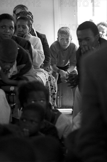 Celebration service for the opening of a new church in Hopewell, Pietermaritzburg, South Africa
9/1999
african, christianity, christians, christian, churches, services, religion, multiracial, multi cultural, white boy, township, non-racial, mixed