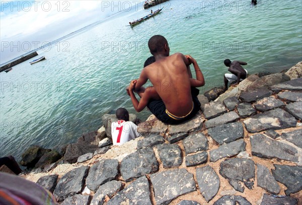 9/2003 Ile de Goree off Dakar, Senegal

sea, boats, water, boat, black couple, rocks, quey, ocean, love, harbour, harbours, island, islands