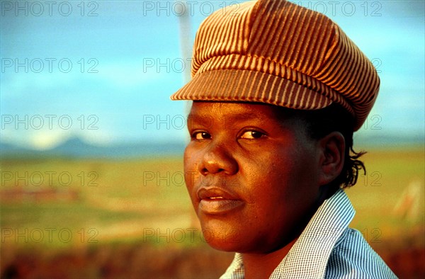 near Bergville, KwaZulu-Natal, South Africa, January 1993
women, girls, girl, lady, ladies, hat,  hats, cap, caps, face, facial features