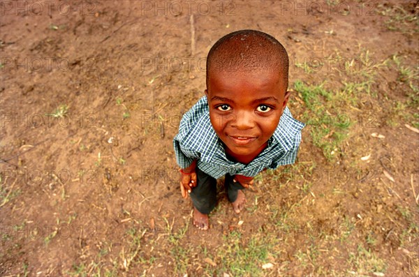 Gingindlovu, KwaZulu-Natal, South Africa 12/2003

little boys, children, child, barefoot, face, eyes, eye, head, heads, smile, small