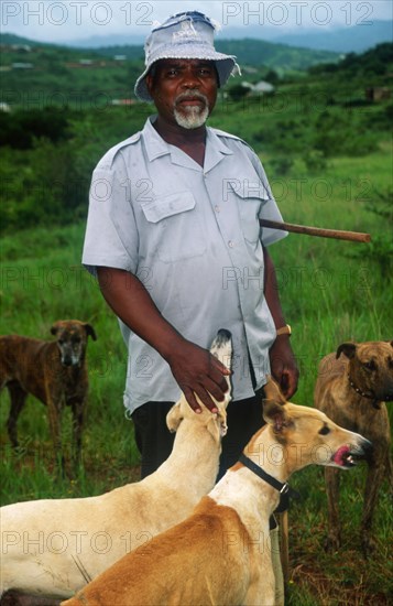 Old man with dogs