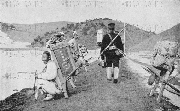 Russo-Japanese War, 1904-1905:  Korean coolies acting as porters for Japanese soldiers