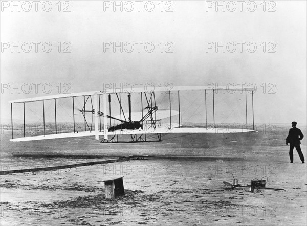 The first mechanized flight, December 17, 1903, Kitty Hawk, North Carolina.  Wilbur and Orville Wright