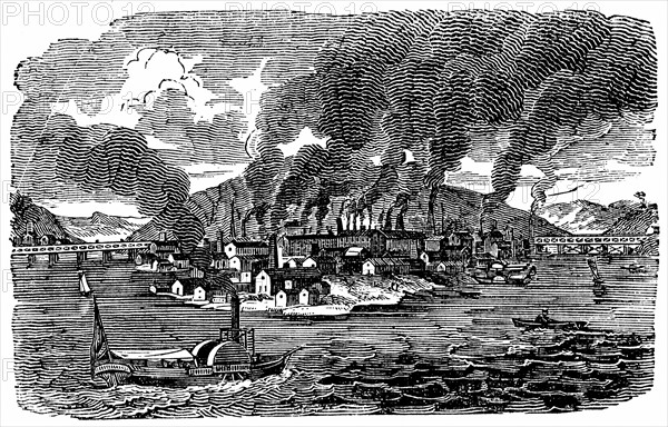 Vue d'ensemble de la ville de Pittsburgh, en pennsylvanie montrant les fumees s'echappant des nombreuses fonderies et des laminoirs