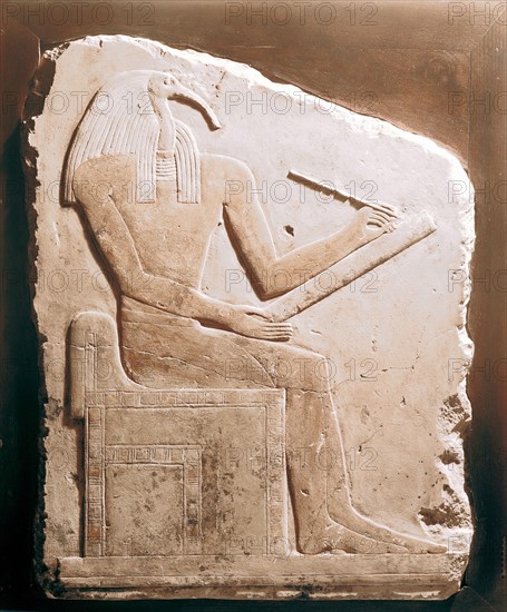 Thoth, Ibis-headed god of the Moon, patron of scribes and magicians, secretary of the gods. Limestone relief, 5th-6th Dynasty