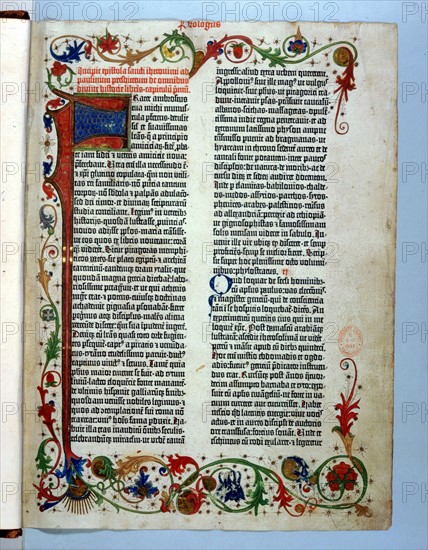 Page of "Bible" printed by Gutenberg, 1456. Illuminated border typical of a manuscript.