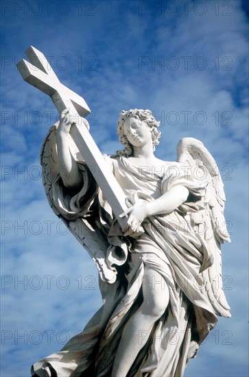 Angel carrying cross