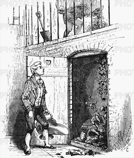 Footman collecting a scuttle of coal