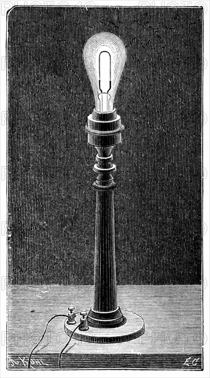 Edison's incandescent light globe in a table lamp fitting
