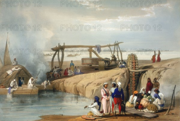 Persian wheel raising water from the Sutlej River - Punjab