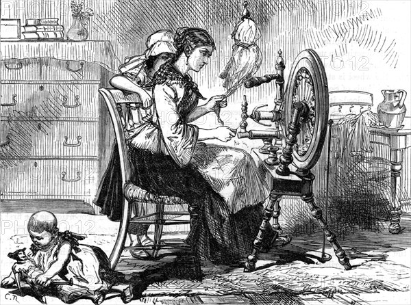 Female homeworker using a treadle spinning wheel