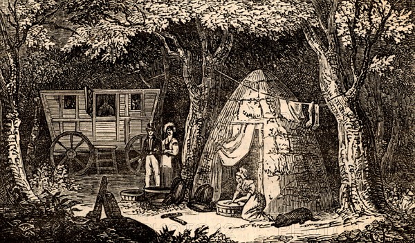 Charcoal burner's caravan and cabin in a wood in the Hythe region of Kent