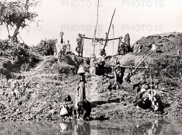 A shaduf or shadoof being used in Egypt, late 1880s