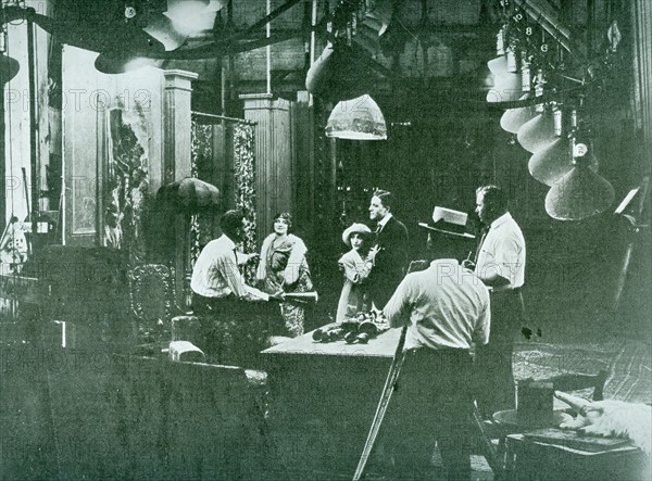 Director on set during the filming of a Silent era film