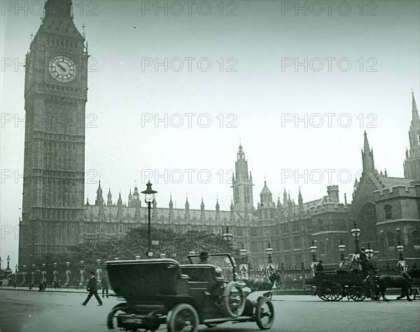Parliament Square, London, c1906, showing early electric lamps, an automobile