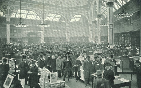 Business in full swing in The Manchester Exchange, headquarters of the grocery trade in Lancashire, England, c1905