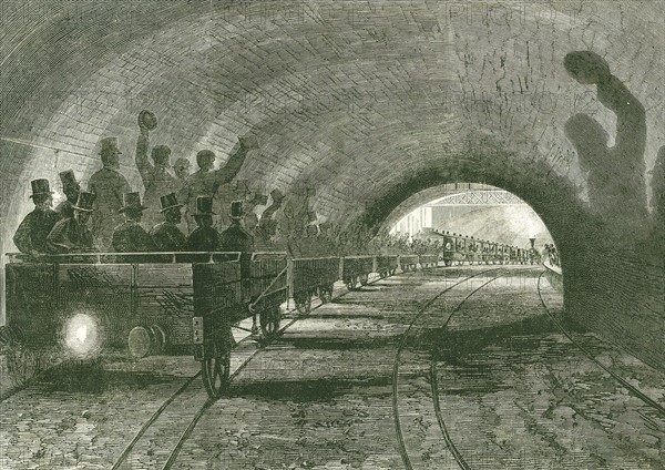 Underground railway: trial trip on the Metropolitan line, train passing Portalnd Road station, London