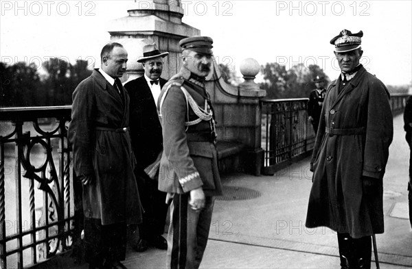 marshall Josef Pilsudski on the Poniatowski Bridge, Warsaw, 12 May 1926, during the May Coup d' État. Also present (right) is At right is General Gustaw Orlicz-Dreszer.
