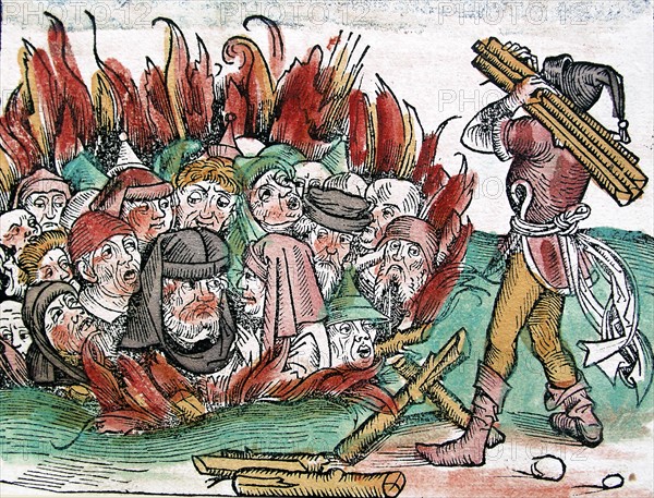 The burning of Jews in germany shown in a coloured woodblock illustration from Liber Chronicarum