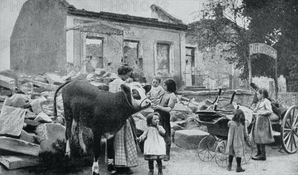 Famille française revenant dans leur village détruit