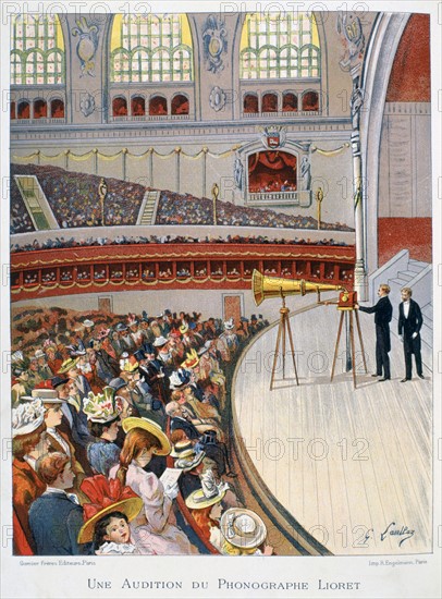 Demonstration on the stage of a crowded auditorium