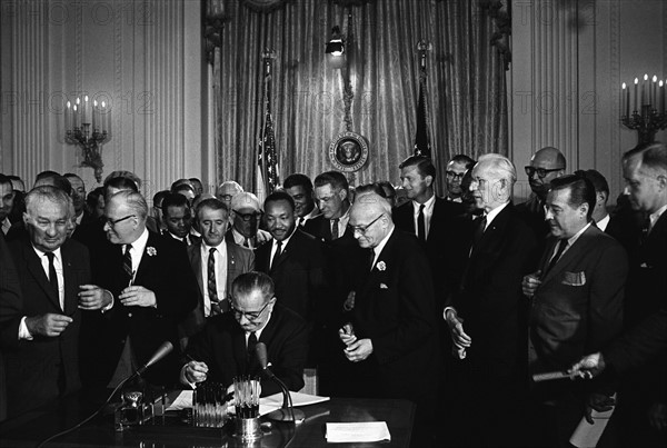 Lyndon Johnson signing the Civil Rights Act, 2 July 1964