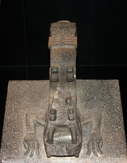 Stone seated figure of Xochipilli