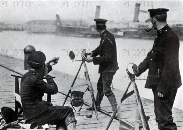 British marines practicing sending and receiving signals by heliograph