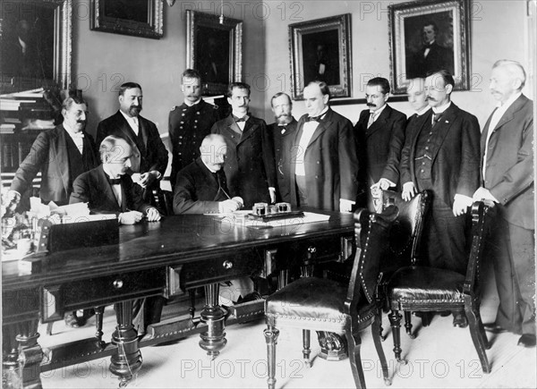 French Ambassador Pierre Paul Cambon signing the Peace Protocol